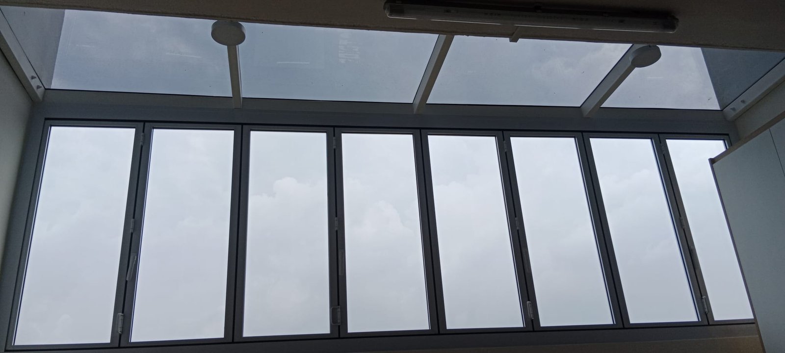 Sunolite ceramic film on bi-fold balcony windows